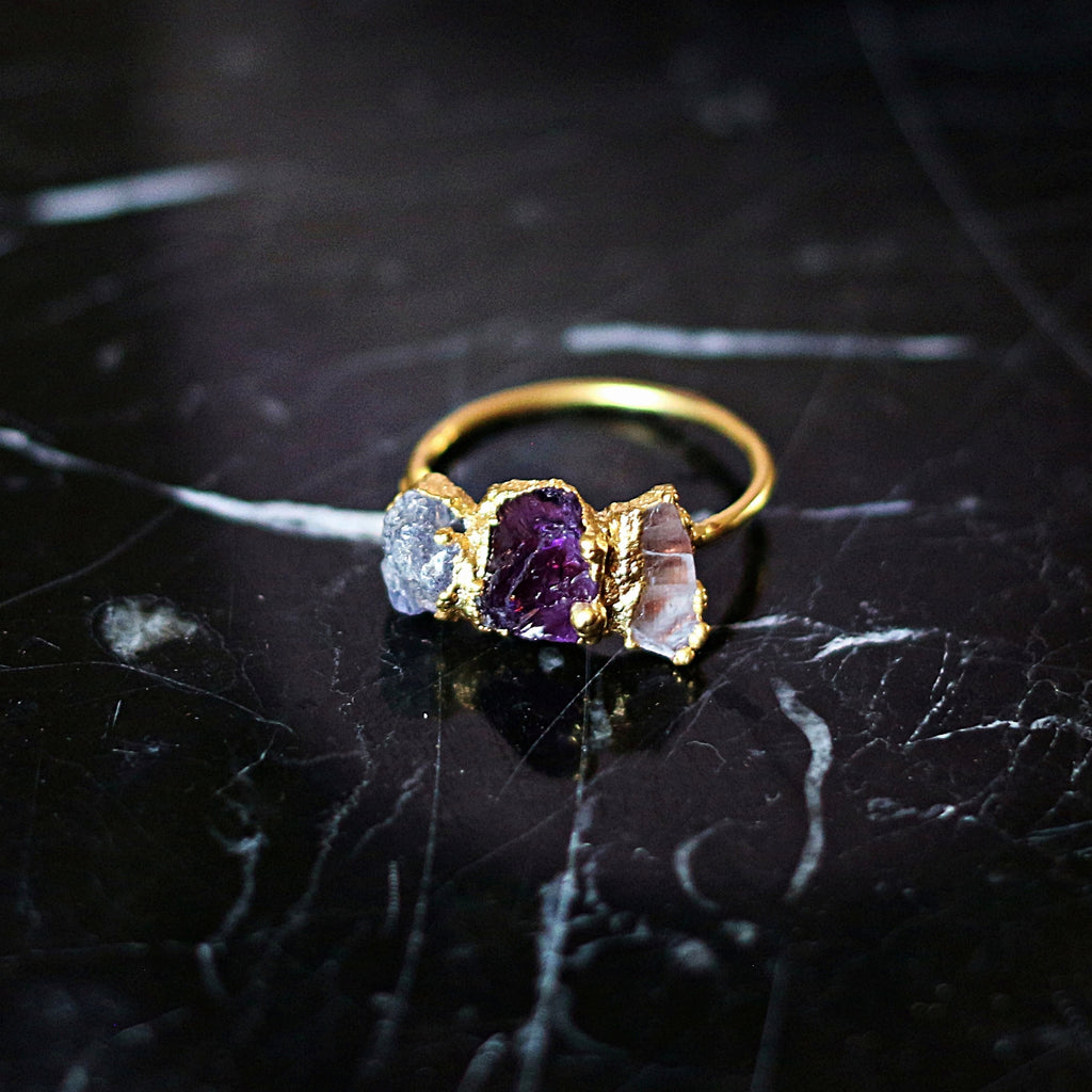 UNIQUE THREE-STONE RING