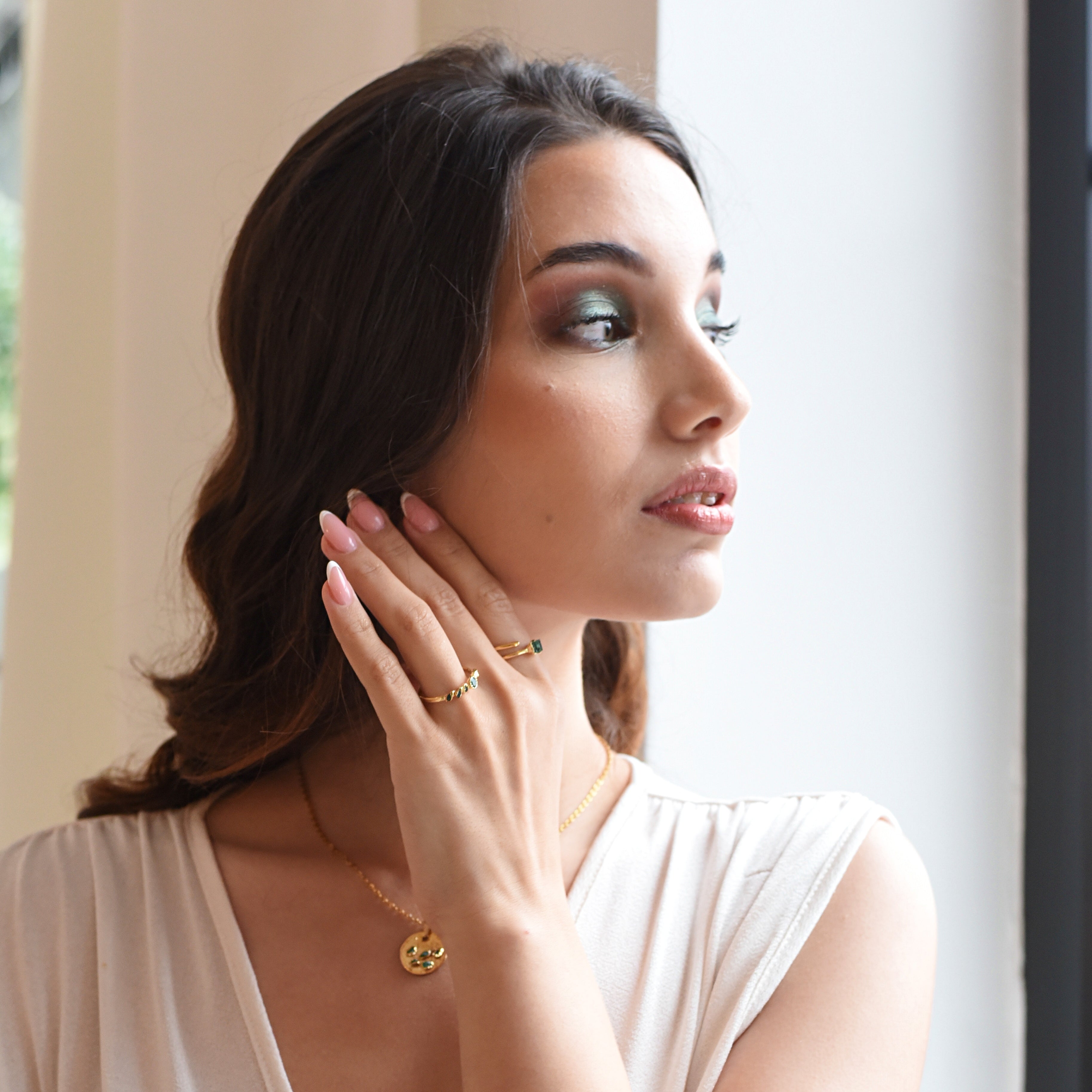 EMERALD STATEMENT RING WITH CUT EMERALD