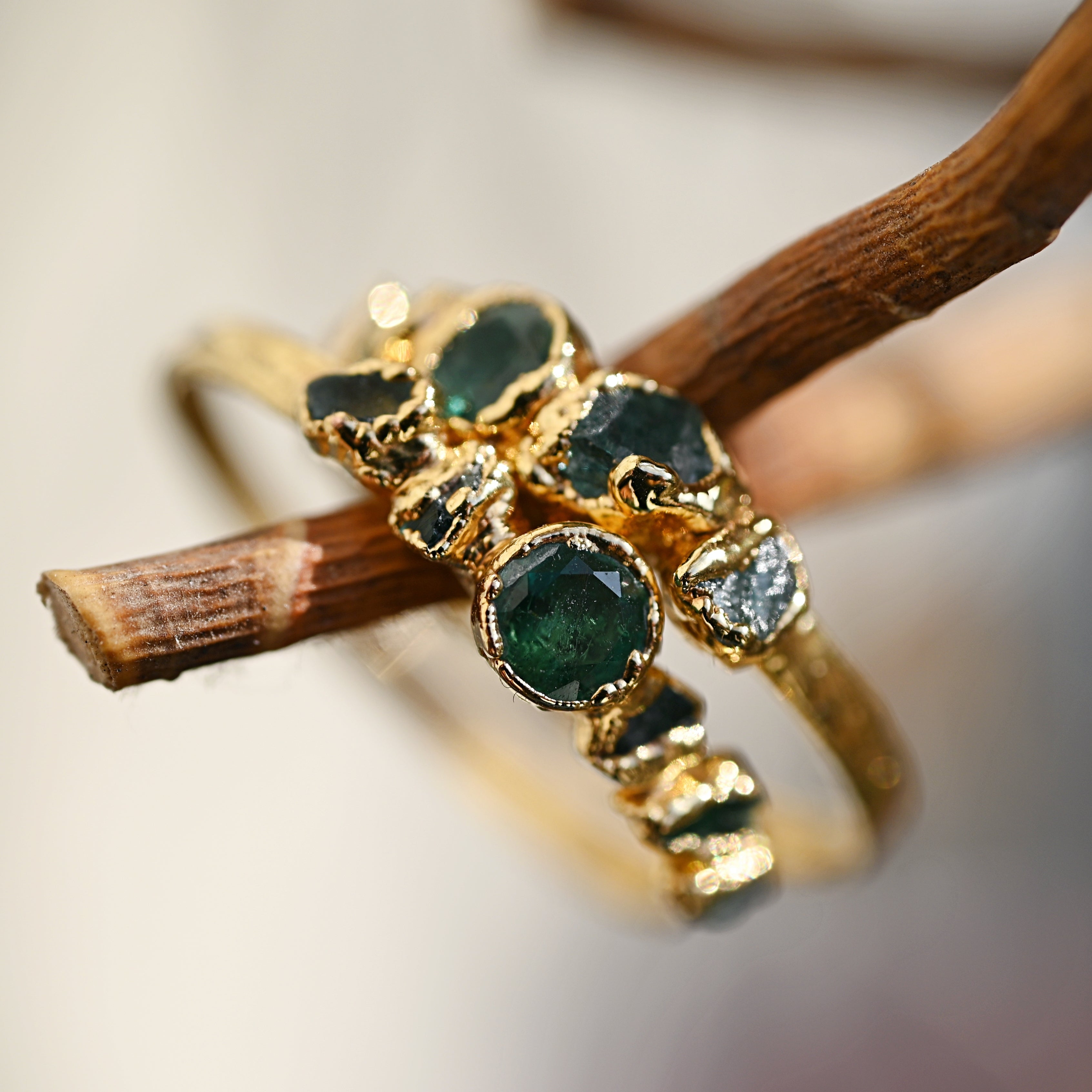 EMERALD STATEMENT RING WITH CUT EMERALD