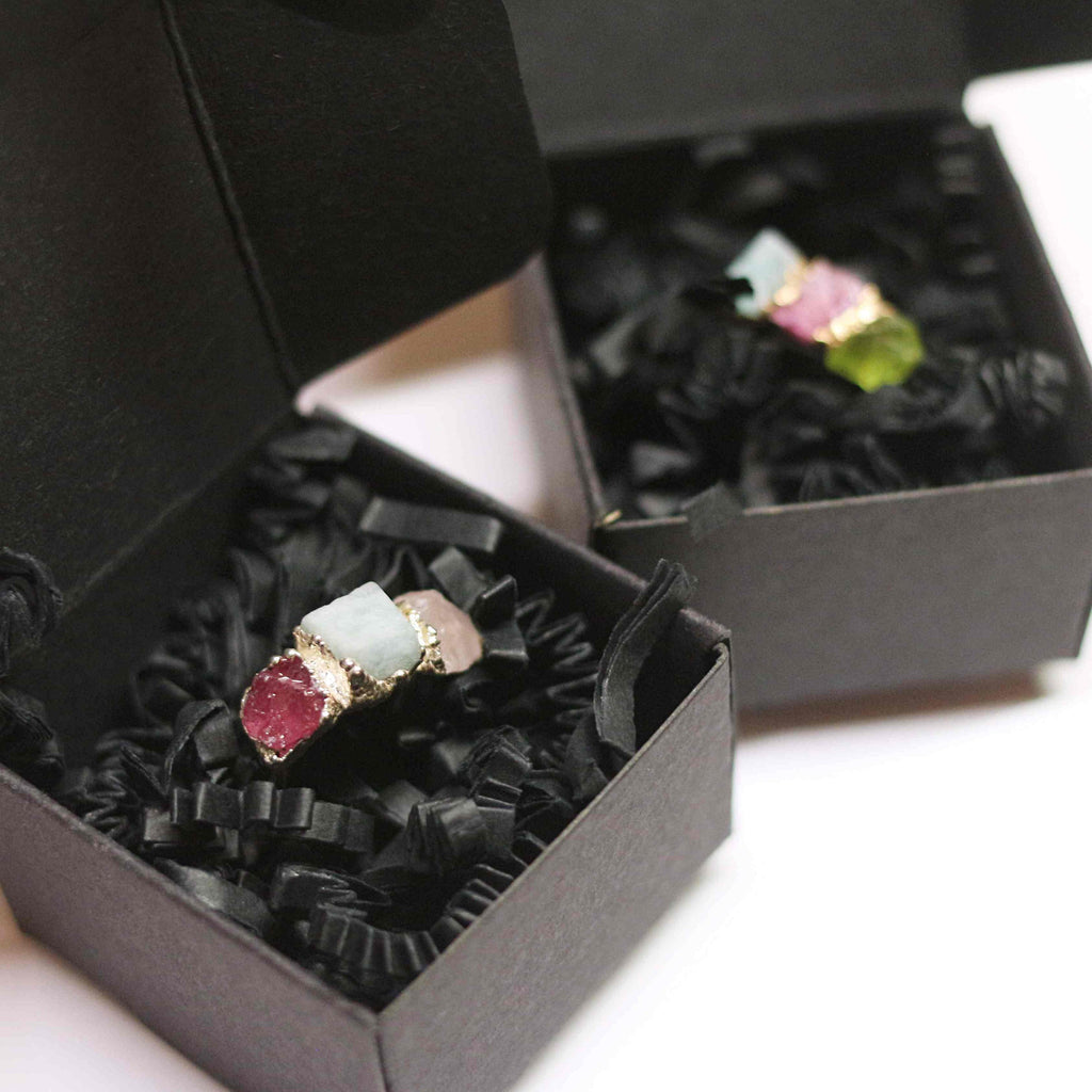 UNIQUE THREE-STONE RING