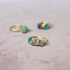 UNIQUE THREE-STONE RING