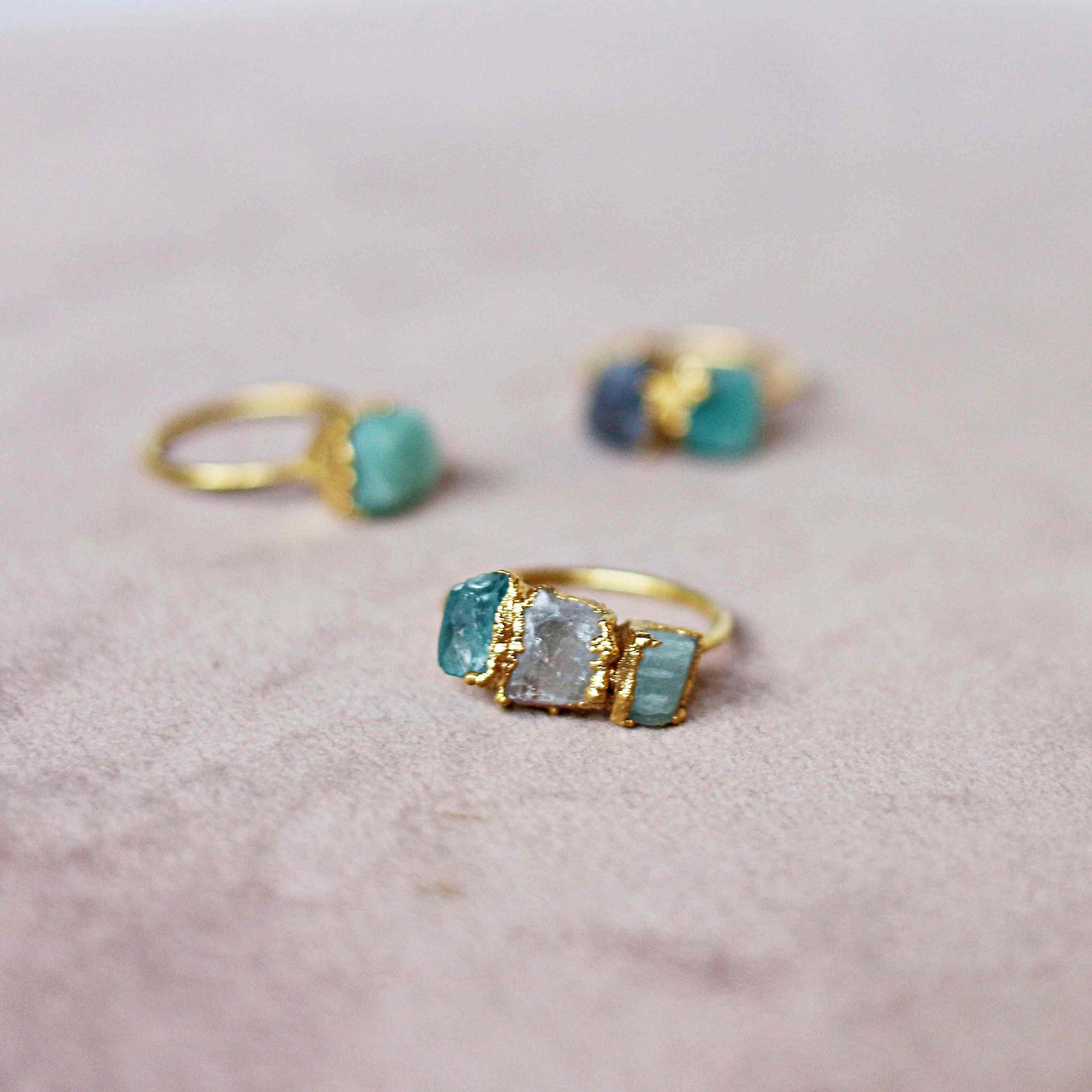 UNIQUE THREE-STONE RING